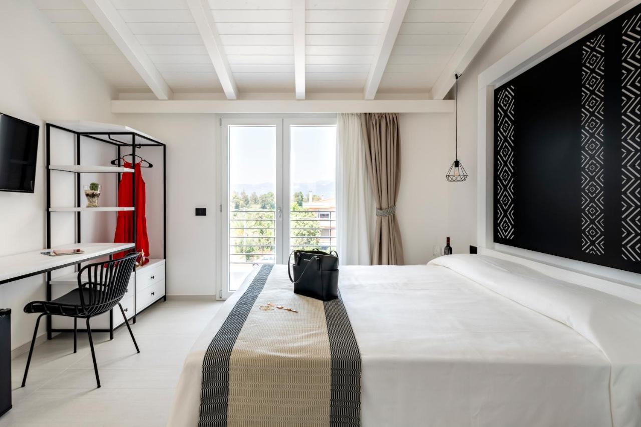 Cara A Bentu - Charming Rooms Тортолі Екстер'єр фото