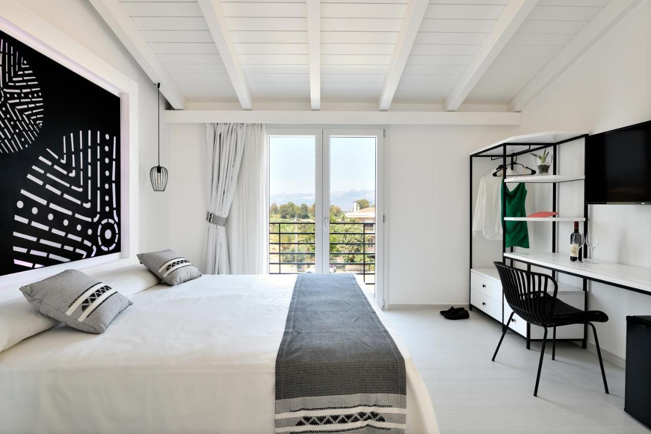 Cara A Bentu - Charming Rooms Тортолі Екстер'єр фото